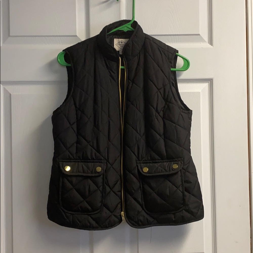 Women’s black quilted vest
